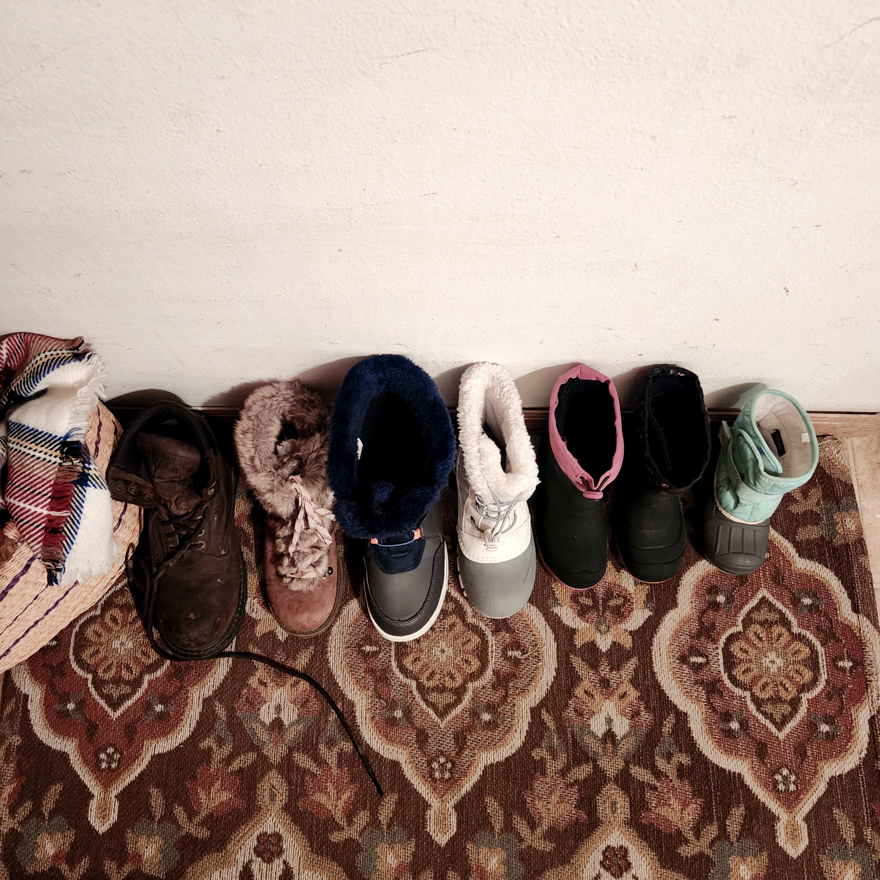 Each Chose a Boot to Line by the Wall;